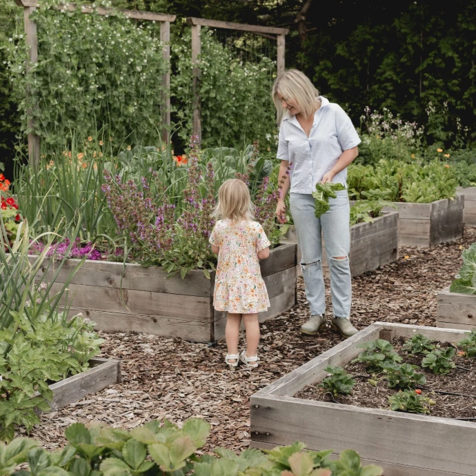 mother and daughter working on a gardening project